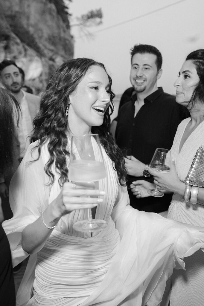 Elena and Mo dancing with flamenco musicians during their welcome party